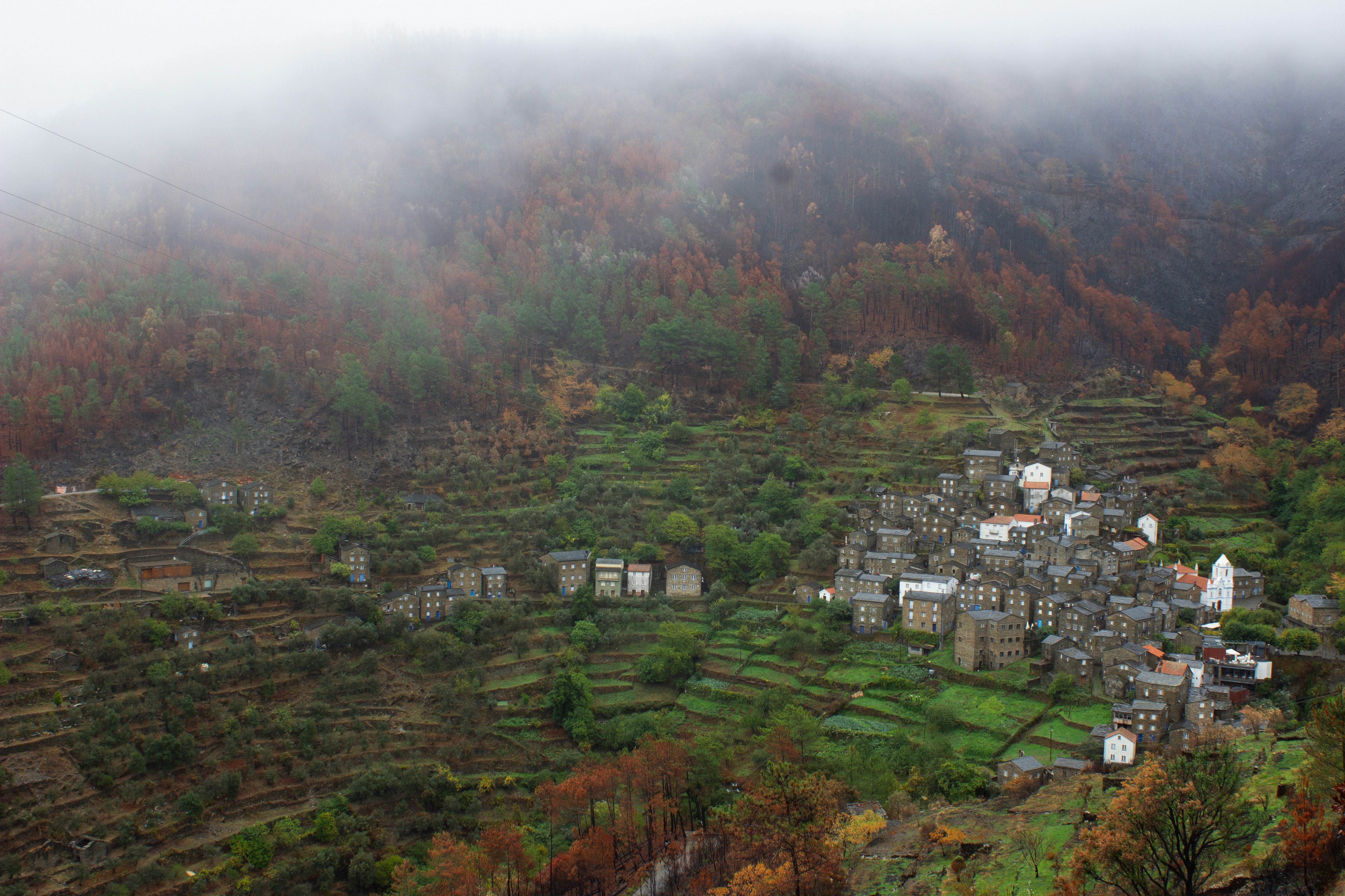 Schist village Portugal mountains mist — ASHWANA The Fractured Elden by Aurelia da Serra